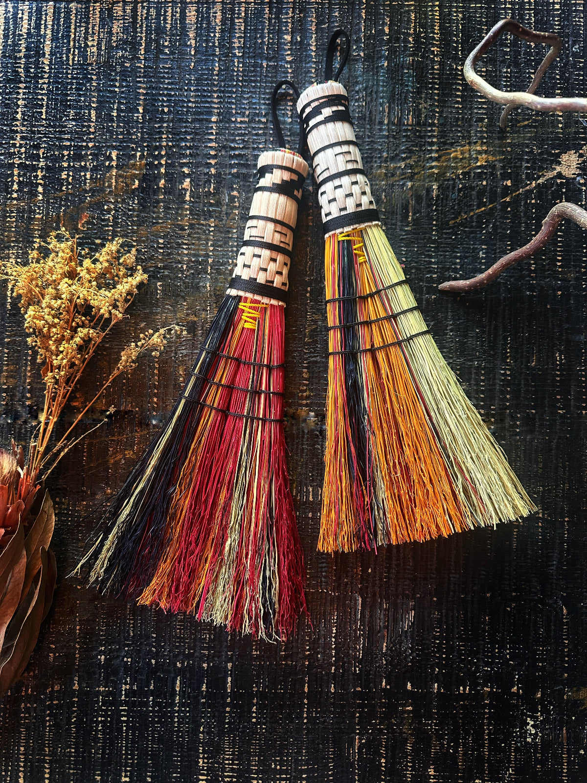 a handmade broom with a woven stitch style by Keven craft rituals